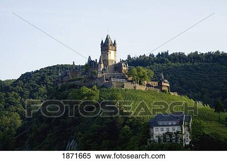 A Castle On A Hill; Cochem, Rheinland-Pfalz, Germany View Large Photo Image Stock Photography - A Castle On A Hill; Cochem, Rheinland-Pfalz, Germany. Fotosearch