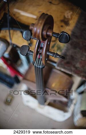 A cello in mid-repair sits in The Sound Post repair shop; Toronto, Ontario, Canada View Large Photo Image Stock Photo - A cello in mid-repair sits in The Sound Post repair shop; Toronto, Ontario, Canada. Fotosearch