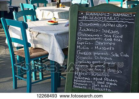 A chalkboard menu at a taverna; Kamares, Sifnos, Cyclades, Greek Islands, Greece View Large Photo Image Stock Image - A chalkboard menu at a taverna; Kamares, Sifnos, Cyclades, Greek Islands, Greece. Fotosearch