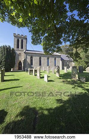 Stock Photo - A Church And Cemetery; Northumberland England. Fotosearch
