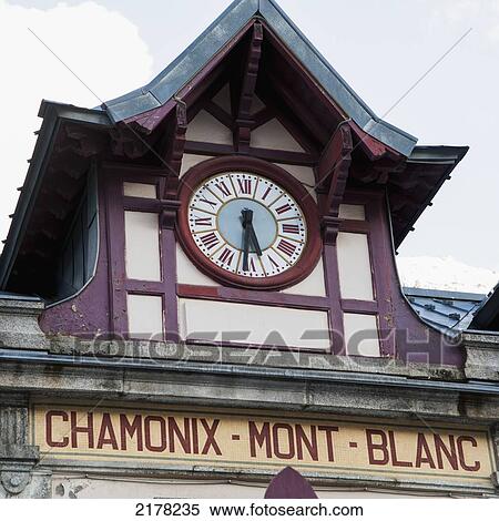 Stock Photography - A Clock On A Building; Chamonix-Mont-Blanc Rhone-Alpes France. Fotosearch