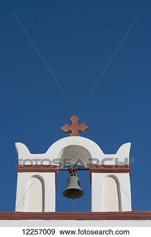 A colourful red and white painted bell tower on a church; Oia, Santorini, Cyclades, Greek Islands, Greece View Large Photo Image Stock Photo - A colourful red and white painted bell tower on a church; Oia, Santorini, Cyclades, Greek Islands, Greece. Fotosearch