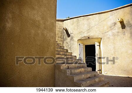 A Concrete Stairway Beside A Pale Yellow Building; Dakar Senegal View Large Photo Image Stock Photo - A Concrete Stairway Beside A Pale Yellow Building; Dakar Senegal. Fotosearch