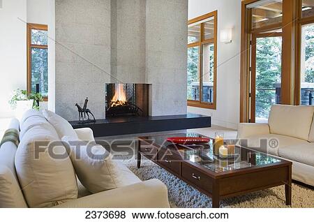 A Contemporary Style Living Room; Whistler, British Columbia, Canada View Large Photo Image Stock Photo - A Contemporary Style Living Room; Whistler, British Columbia, Canada. Fotosearch