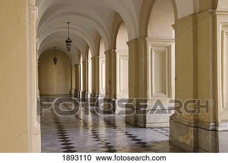 Stock Image - A Corridor With Tile Floors And Columns In The Manzana Jesuitica; Cordoba, Argentina. Fotosearch