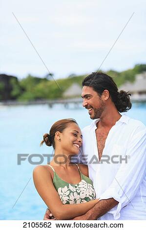 A Couple At The Bora Bora Nui Resort & Spa; Bora Bora Island Society Islands French Polynesia South Pacific View Large Photo Image Stock Image - A Couple At The Bora Bora Nui Resort & Spa; Bora Bora Island Society Islands French Polynesia South Pacific. Fotosearch