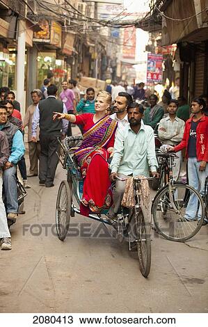 A Couple In A Cycle Rickshaw; Ludhiana, Punjab, India View Large Photo Image Stock Image - A Couple In A Cycle Rickshaw; Ludhiana, Punjab, India. Fotosearch