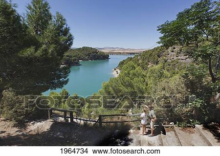 Picture - A Couple Looking Out Over Guadalhorce Dam; Malaga Province Spain. Fotosearch
