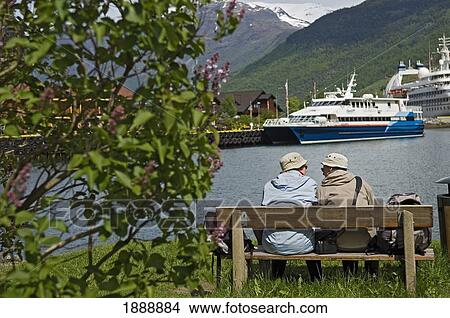 Picture - A Couple Of Old Ladies Sitting On Bench By Cruise Ships. Fotosearch