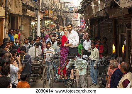 Picture - A Couple Standing And Posing In A Cycle Rickshaw; Ludhiana, Punjab, India. Fotosearch