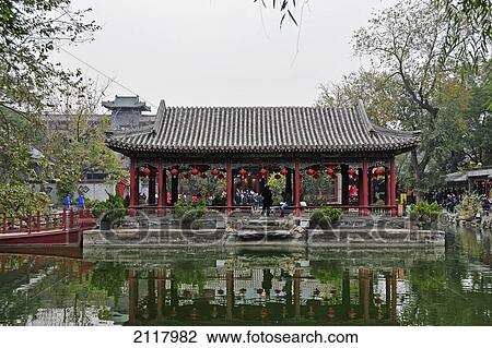 A Covered Structure With Red Pillars Reflected In A Pond; Beijing China View Large Photo Image Stock Image - A Covered Structure With Red Pillars Reflected In A Pond; Beijing China. Fotosearch