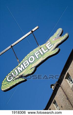 A Crocodile Shaped Sign For Gumbofile, A Cafe Bar, In The French Quarter, New Orleans, Louisiana, Usa View Large Photo Image Stock Photograph - A Crocodile Shaped Sign For Gumbofile, A Cafe Bar, In The French Quarter, New Orleans, Louisiana, Usa. Fotosearch