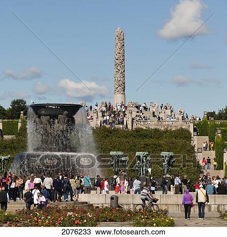 Stock Image - A Crowd Gathers At Frogner Park Vigeland Sculpture Park; Oslo Norway. Fotosearch