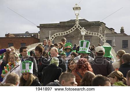 A Crowd Of People Many Having Hats Celebrating Saint Patrick's Day; County Dublin Ireland View Large Photo Image Stock Photo - A Crowd Of People Many Having Hats Celebrating Saint Patrick's Day; County Dublin Ireland. Fotosearch