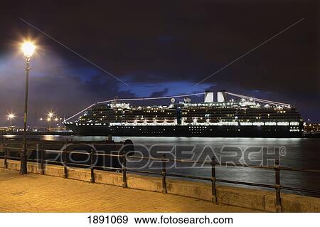 Stock Photo - A Cruise Ship In The Harbor Illuminated At Night; South Shields, Tyne And Wear, England. Fotosearch