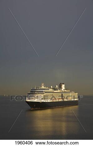 Stock Photograph - A Cruise Ship In Tranquil Water At Dawn; Saint Petersburg, Russia. Fotosearch