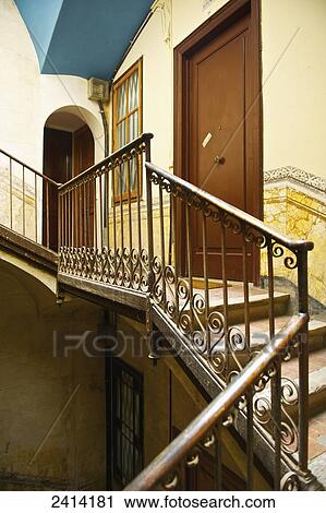 A decorative railing outside a residential door and entrance; Barcelona, Spain View Large Photo Image Stock Image - A decorative railing outside a residential door and entrance; Barcelona, Spain. Fotosearch