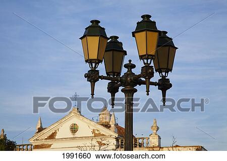 Stock Image - A Decorative Street Light; Faro Algarve Portugal. Fotosearch