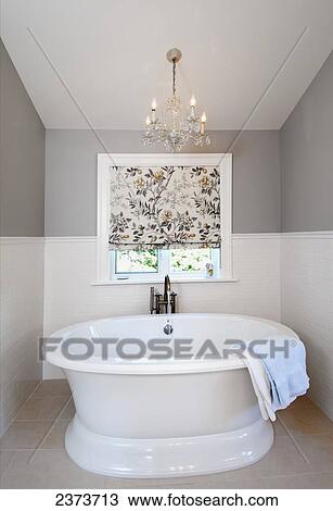 Stock Image - A Deep Soaker Bathtub In A Contemporary Bathroom; Vancouver Island, British Columbia, Canada. Fotosearch