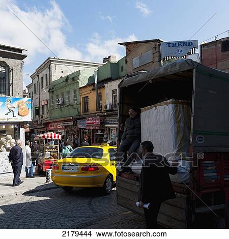 Picture - A Delivery In The Back Of A Truck In A Busy Street; Istanbul Turkey. Fotosearch