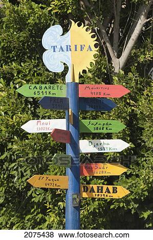 A Destination And Direction Sign; Tarifa Cadiz Andalusia Spain View Large Photo Image Stock Photo - A Destination And Direction Sign; Tarifa Cadiz Andalusia Spain. Fotosearch