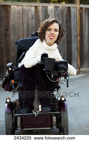 A disabled female sitting in her wheelchair; San Francisco, California, USA View Large Photo Image Stock Photography - A disabled female sitting in her wheelchair; San Francisco, California, USA. Fotosearch