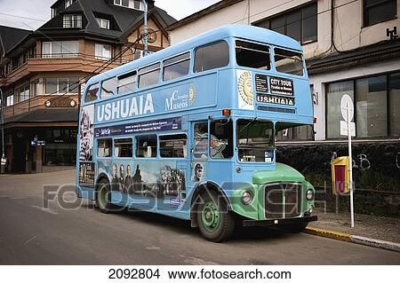 A Double-Decker Bus On The Street; Ushuaia, Tierra Del Fuego, Argentina View Large Photo Image Picture - A Double-Decker Bus On The Street; Ushuaia, Tierra Del Fuego, Argentina. Fotosearch