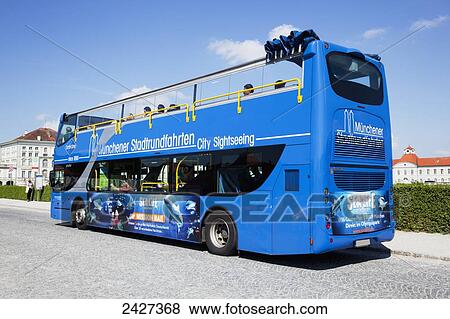 Stock Photo - A double decker tour bus at Nymphenburg Palace; Munich, Bayern, Germany. Fotosearch
