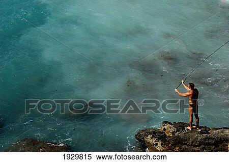 A Fisherman Off The Coast Of Liguria; Italy View Large Photo Image Stock Photography - A Fisherman Off The Coast Of Liguria; Italy. Fotosearch