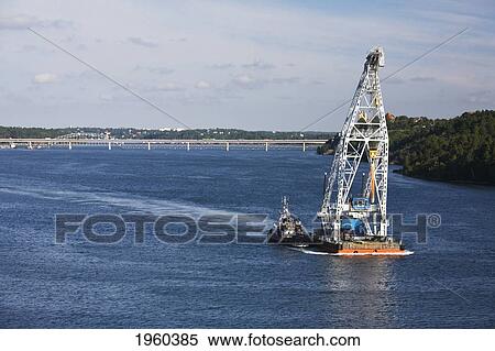 Stock Photography - A Floating Crane In The Entrance Of The Fjord; Stockholm, Sweden. Fotosearch