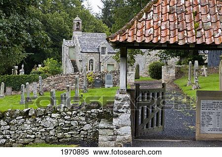 A Gate Leading Into A Cemetery Beside A Church; Northumberland England View Large Photo Image Stock Photography - A Gate Leading Into A Cemetery Beside A Church; Northumberland England. Fotosearch