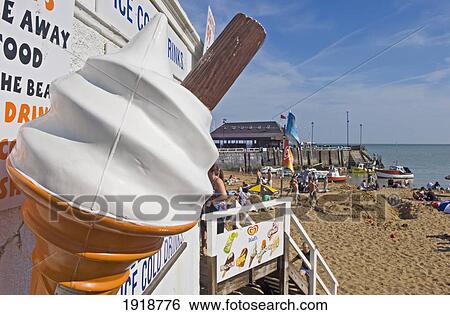 Stock Photograph - A Giant Ice-Cream Outside An Ice-Cream Stall On Broadstairs Beach, Kent, England, Uk. Fotosearch