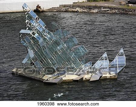 Stock Photo - A Glass Sculpture In The Water Outside The Oslo Opera House; Oslo, Norway. Fotosearch