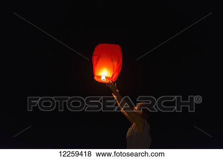 A glowing lantern on Serendipity Beach; Sihanoukville, Cambodia View Large Photo Image Stock Photo - A glowing lantern on Serendipity Beach; Sihanoukville, Cambodia. Fotosearch