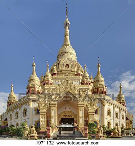 Stock Image - A Gold Temple; Mangshi Yunnan China. Fotosearch