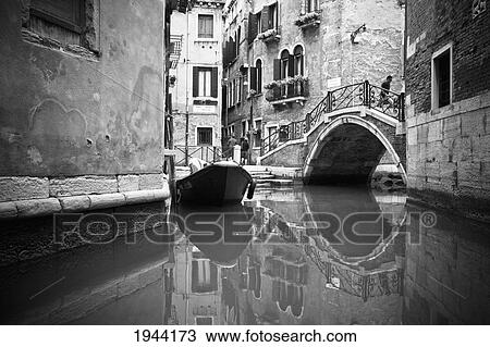 A Gondola And Bridge Over The Canal; Venice Venezia Italy View Large Photo Image Stock Image - A Gondola And Bridge Over The Canal; Venice Venezia Italy. Fotosearch