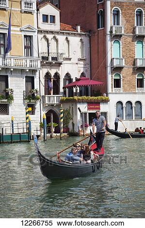 A gondola on the Grand Canal; Venice, Italy View Large Photo Image Stock Photography - A gondola on the Grand Canal; Venice, Italy. Fotosearch