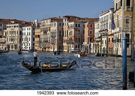 A Gondolier And Passengers In A Gondola On The Grand Canal; Venice Italy View Large Photo Image Stock Image - A Gondolier And Passengers In A Gondola On The Grand Canal; Venice Italy. Fotosearch