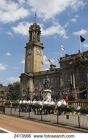 Stock Photograph - A group gathers outside the Edwardian Town Hall; South Shields, Tyne and Wear, England. Fotosearch