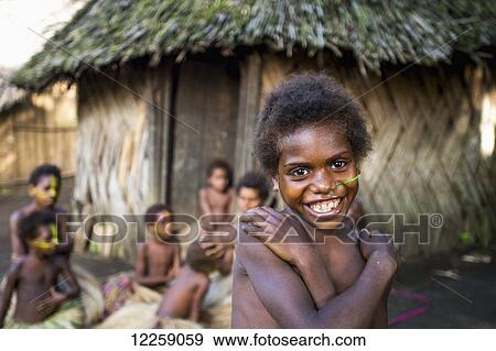 Stock Photo - A group of children at Yakel Village; Tanna Island, Vanuatu. Fotosearch