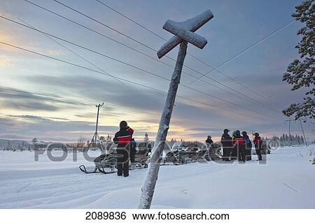 A Group Of People With Snowmobiles Enjoying The View Near Levi, Lapland, Finland View Large Photo Image Stock Photograph - A Group Of People With Snowmobiles Enjoying The View Near Levi, Lapland, Finland. Fotosearch