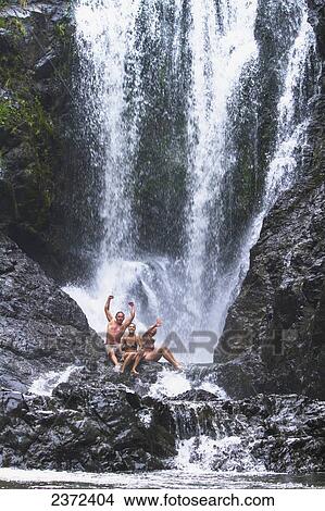 A Group Of Swimmers At Piroa Falls; Waipu, New Zealand View Large Photo Image Picture - A Group Of Swimmers At Piroa Falls; Waipu, New Zealand. Fotosearch