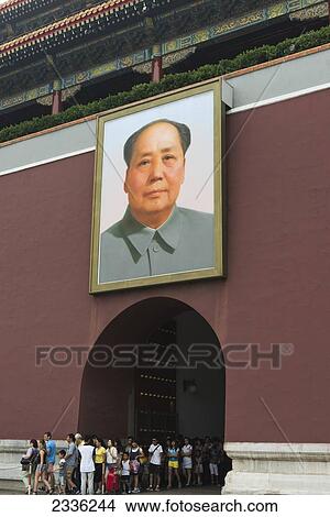 Picture - A Group Of Tourists Leave A Building In Forbidden City With A Large Picture Of A Political Leader Over The Arched Doorway; Beijing, China. Fotosearch