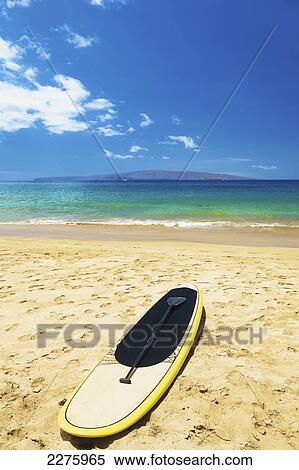 Stock Photography - A kayak on the beach of an hawaiian island; Hawaii, United States of America. Fotosearch