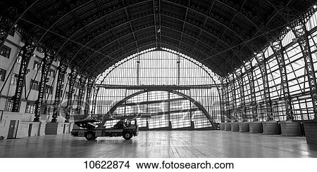 Picture - A ladder truck inside a large open building with windows; Santiago, Santiago Metropolitan Region, Chile. Fotosearch