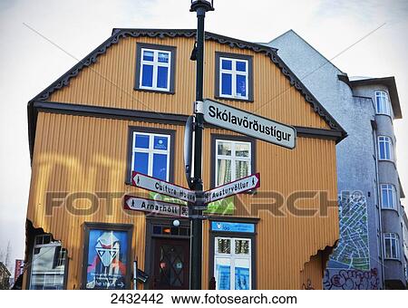 Stock Image - A lamp post with landmark signs; Reykjavik, Iceland. Fotosearch