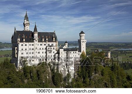 A Large Bavarian Castle On A Hillside With Fields, Lake And Village In The Background; Fussen, Germany View Large Photo Image Stock Image - A Large Bavarian Castle On A Hillside With Fields, Lake And Village In The Background; Fussen, Germany. Fotosearch