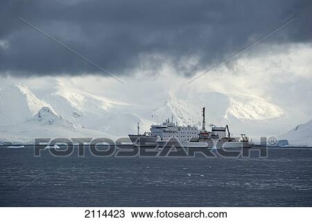Stock Image - A Large Ship In The Southern Ocean Along The Coast; Antarctica. Fotosearch