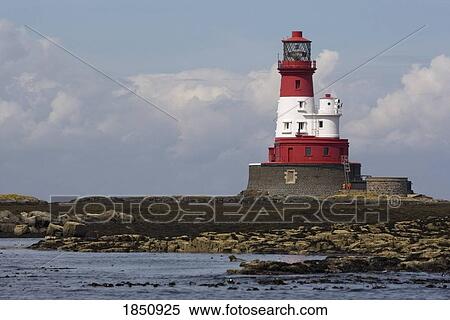 Stock Photography - A Lighthouse On A Shoreline. Fotosearch