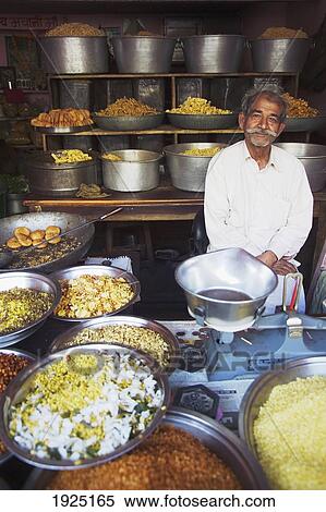 A Man Inside His Kirana Pulses Shop In Jaipur, Rajasthan, India View Large Photo Image Stock Photography - A Man Inside His Kirana Pulses Shop In Jaipur, Rajasthan, India. Fotosearch